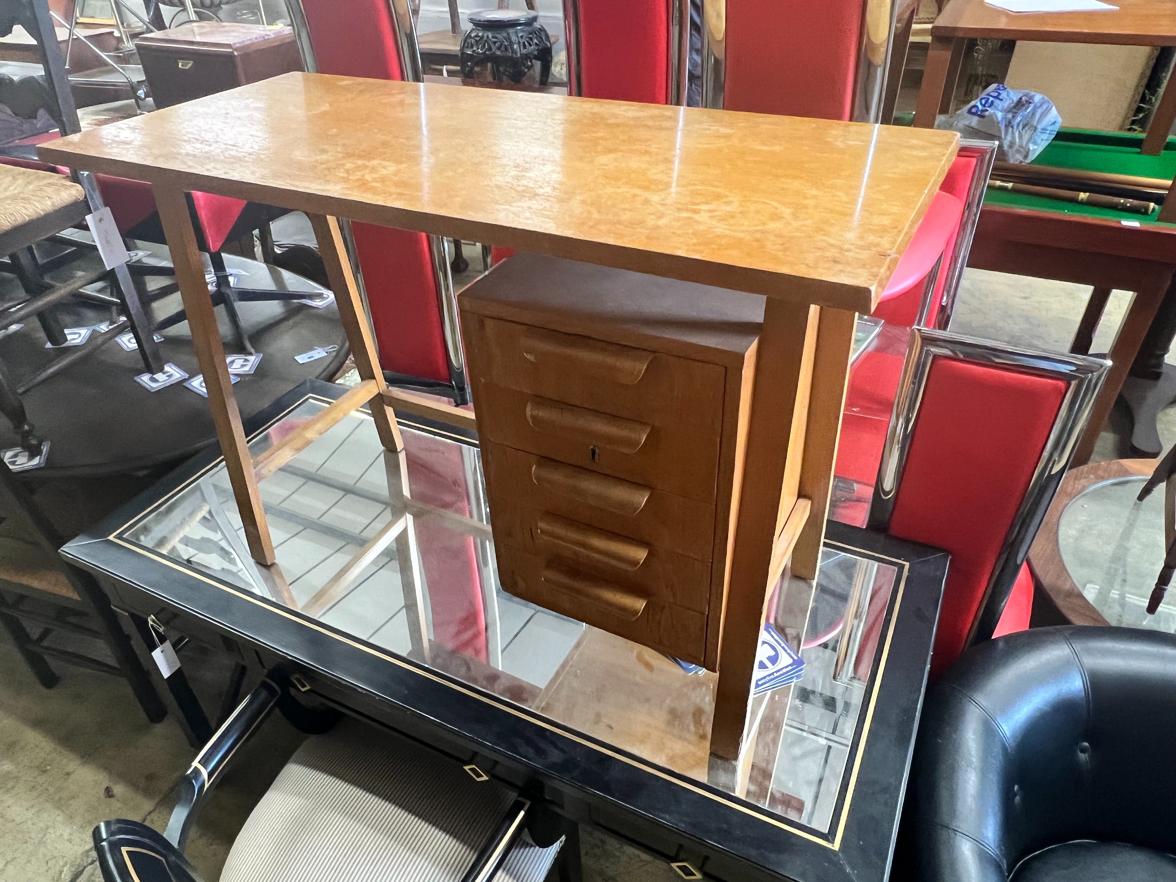 A Gordon Russell teak desk, width 99cm, depth 44cm height 69cm